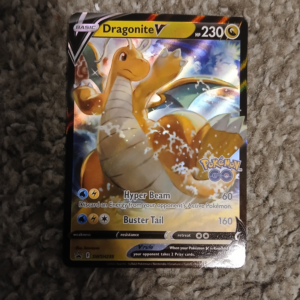 Pokemon Dragonite V Card with Orange and Yellow